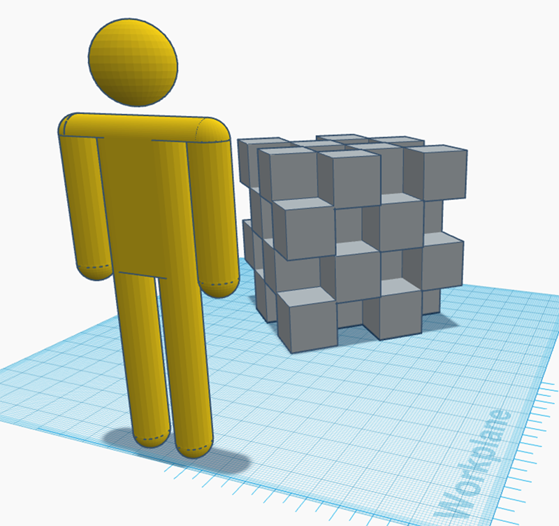 A yellow stick figure stands on a blue grid next to a 4x4 stack of gray cubes. The scene appears to be a 3D digital model.