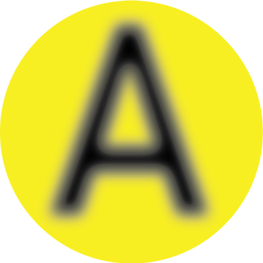 A large, black, uppercase letter A appears in the center of a bright yellow circle. The letter is blurred, creating a soft, out-of-focus effect.