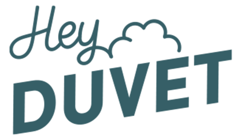 Hey DUVET logo with Hey in cursive, a cloud graphic, and DUVET in bold uppercase letters.
