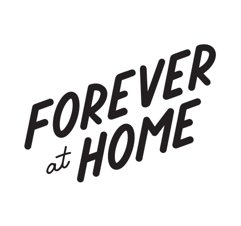 Black handwritten-style text reads FOREVER at HOME on a transparent background.