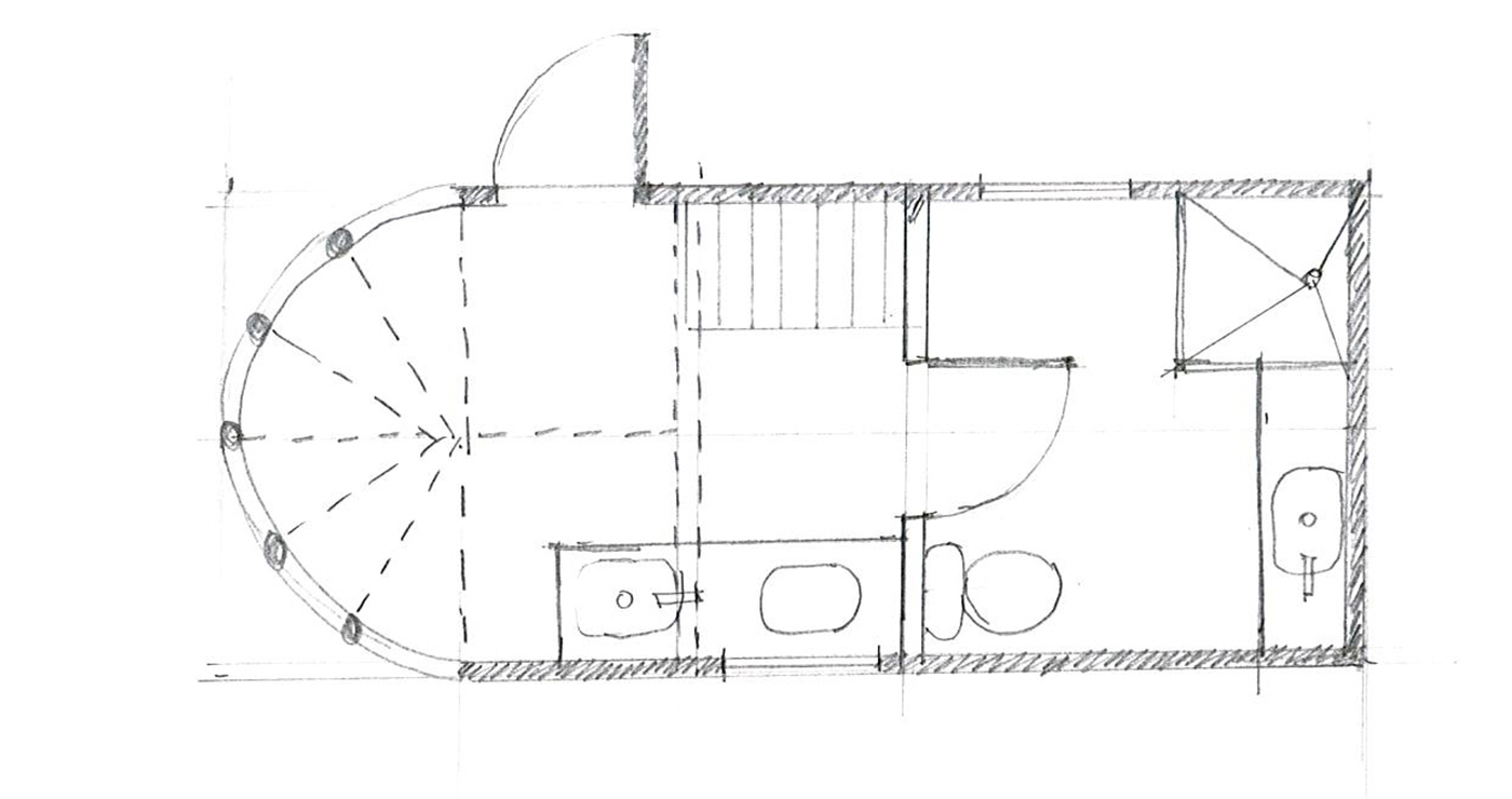 Hand-drawn floor plan sketch showing a curved room on the left, a central hallway with stairs, a bathroom with a toilet, sink and shower, and additional rooms to the right.