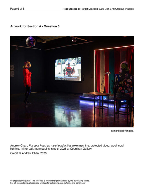 The 2026 Art Creative Practice Unit 2 Examination gallery installation includes two mannequins in colorful attire—one seated, one standing—facing a video projection. Mirrors, stools, spotlights, and a dark floor complete the immersive scene.